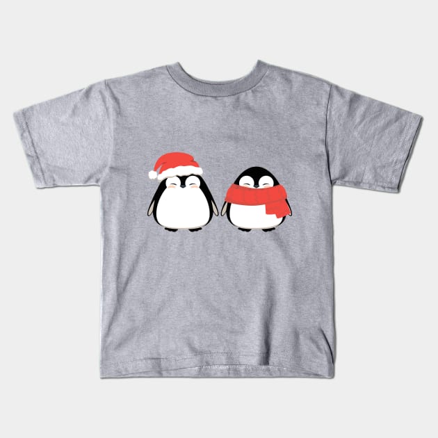 Couple of cute penguins, friends in winter Christmas red hat and scarf. Kids T-Shirt by CraftCloud